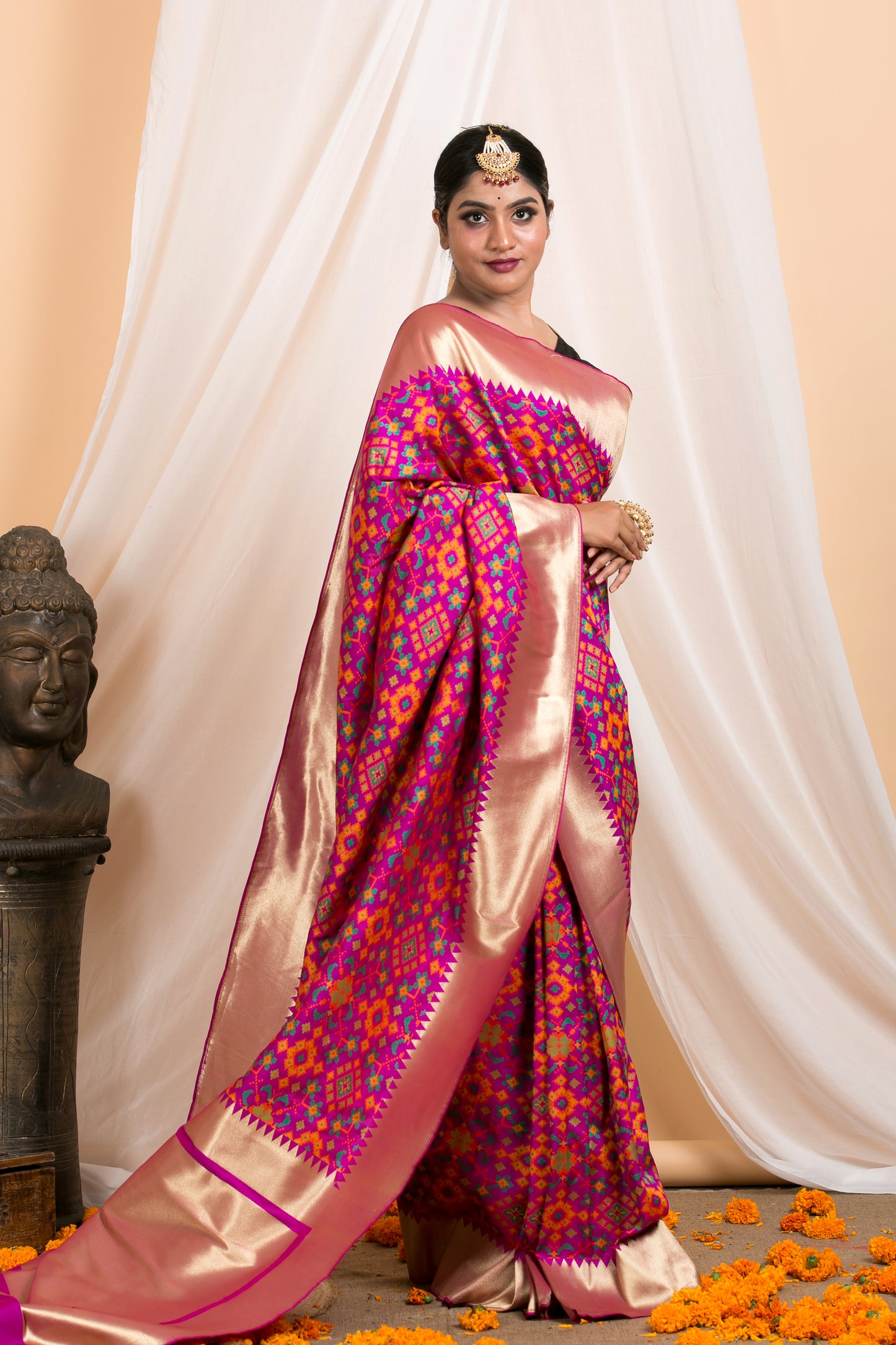 purple banarasi saree with patola pattern