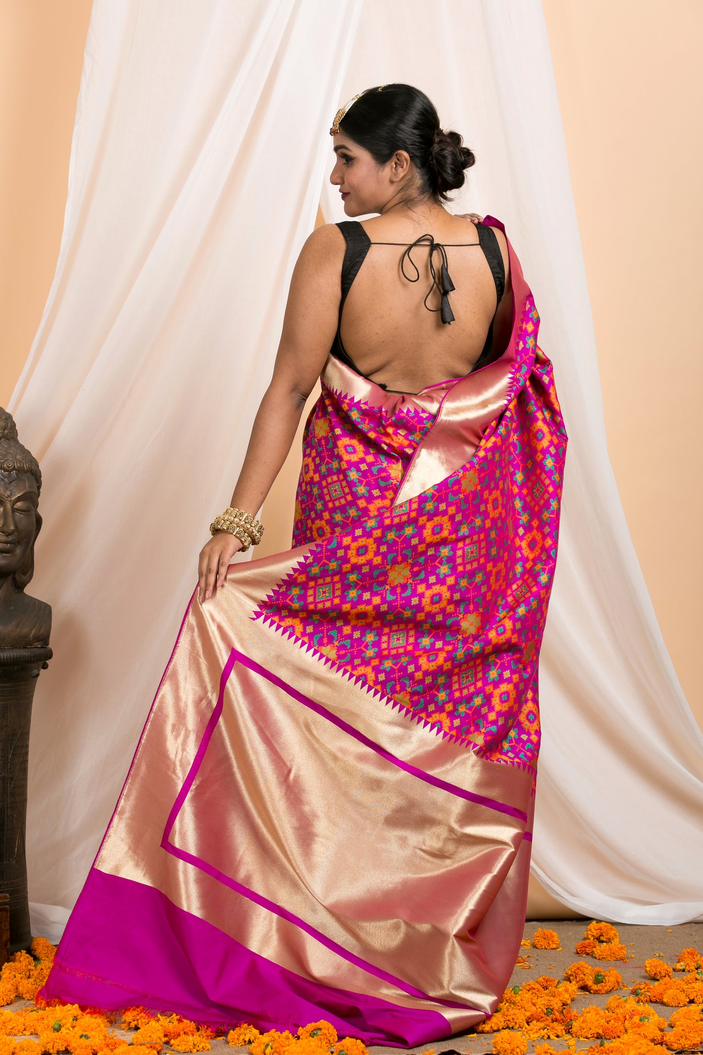 purple banarasi saree with patola pattern